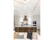 Modern kitchen features a large island with seating and pendant lights, with the view from the living room at 3139 Vanessa Lynne Ln, Johns Island, SC 29455