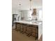 Bright and spacious kitchen featuring a large island with bar stools, sleek appliances, and pendant lighting at 3139 Vanessa Lynne Ln, Johns Island, SC 29455