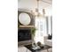 Living room features a modern fireplace and mantle with decorative mirror and stylish furnishings at 3139 Vanessa Lynne Ln, Johns Island, SC 29455