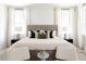 Elegantly furnished main bedroom featuring neutral tones, ambient lighting, and stylish décor at 3139 Vanessa Lynne Ln, Johns Island, SC 29455