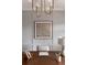 Elegant home office featuring paneled walls, artwork, and a stylish wood desk at 3139 Vanessa Lynne Ln, Johns Island, SC 29455
