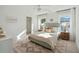 Bright bedroom with stylish decor, natural light, and views of the outdoors at 3143 Vanessa Lynne Ln, Johns Island, SC 29455