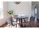 Cozy dining area with seating for four, complemented by natural light and modern decor at 3143 Vanessa Lynne Ln, Johns Island, SC 29455