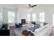 Inviting living room featuring a modern fireplace, comfortable seating, and plenty of natural light at 3143 Vanessa Lynne Ln, Johns Island, SC 29455