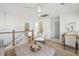 Upstairs loft area with natural light, neutral decor, and stairs leading to another level at 3143 Vanessa Lynne Ln, Johns Island, SC 29455