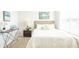 Bedroom with soft lighting, comfortable bed, and bedside table at 317 Salvia Sq, Moncks Corner, SC 29461