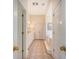 Bright bathroom with double vanity sinks, tile floors, and a soaking tub at 3331 Cottonfield Dr, Mount Pleasant, SC 29466