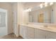 Bathroom featuring a double vanity with large mirror, and separate rooms for the toilet and closet at 3331 Cottonfield Dr, Mount Pleasant, SC 29466