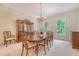 Dining room with a large wood table and matching china cabinet at 3331 Cottonfield Dr, Mount Pleasant, SC 29466