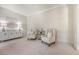 Living room with neutral palette and two large chairs at 3331 Cottonfield Dr, Mount Pleasant, SC 29466