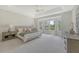 Spacious main bedroom with a large bay window, a tray ceiling, and neutral decor at 3331 Cottonfield Dr, Mount Pleasant, SC 29466