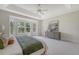 Comfortable main bedroom featuring a bay window, carpet, and modern furniture at 3331 Cottonfield Dr, Mount Pleasant, SC 29466