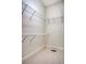 An empty walk-in closet featuring neutral carpet, base trim and adjustable white wire shelving at 3331 Cottonfield Dr, Mount Pleasant, SC 29466