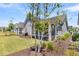 Scenic backyard with lush greenery and a charming patio area at 3529 Habenaria Rd # 33, Mount Pleasant, SC 29466