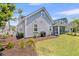 Well-maintained backyard with lush grass, patio, and tasteful landscaping at 3529 Habenaria Rd # 33, Mount Pleasant, SC 29466