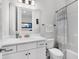 Bathroom with a mirror, white cabinets, and a bathtub at 3529 Habenaria Rd # 33, Mount Pleasant, SC 29466