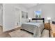 Bedroom with bathroom entrance, window, and a bed at 3529 Habenaria Rd # 33, Mount Pleasant, SC 29466
