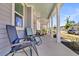 Inviting front porch with comfortable seating, great for relaxing and enjoying the neighborhood at 3529 Habenaria Rd # 33, Mount Pleasant, SC 29466