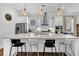 Bright kitchen with a large island, pendant lighting, and stainless steel appliances at 3529 Habenaria Rd # 33, Mount Pleasant, SC 29466