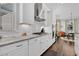 Modern kitchen with white cabinets, stainless steel appliances, and granite countertops at 3529 Habenaria Rd # 33, Mount Pleasant, SC 29466