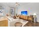 Bright and modern living room featuring stylish furnishings, hardwood flooring, and large windows for plenty of light at 3529 Habenaria Rd # 33, Mount Pleasant, SC 29466