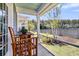 Cozy porch with chairs and table, offering a tranquil outdoor space at 3529 Habenaria Rd # 33, Mount Pleasant, SC 29466