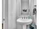 Powder room with a vessel sink, faucet, and a mirror at 3529 Habenaria Rd # 33, Mount Pleasant, SC 29466
