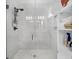 Bright bathroom with a glass shower, marble tiles, and toiletries at 3529 Habenaria Rd # 33, Mount Pleasant, SC 29466