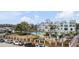 Scenic aerial view showcasing community pool, houses, and well-maintained landscaping at 405 Spartina Ln # 405, Charleston, SC 29492