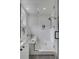 Modern bathroom features a separate shower and tub, white subway tiles, and sleek fixtures at 405 Spartina Ln # 405, Charleston, SC 29492