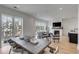 Spacious living room with a fireplace, hardwood floors, and plenty of natural light at 405 Spartina Ln # 405, Charleston, SC 29492