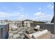 Inviting rooftop deck features stylish outdoor seating and panoramic views, perfect for relaxing and entertaining at 405 Spartina Ln # 405, Charleston, SC 29492