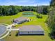 A picturesque property featuring a pond, expansive green space, and a well-maintained residence at 407 Spruce Ivy St, Moncks Corner, SC 29461
