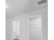 Bright bedroom featuring closet and bathroom access; all painted in neutral colors at 407 Spruce Ivy St, Moncks Corner, SC 29461