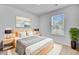 Comfortable bedroom with neutral decor, wood nightstands, and a window for natural light at 407 Spruce Ivy St, Moncks Corner, SC 29461