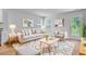 Comfortable living room with plush seating, stylish decor, and natural light throughout at 407 Spruce Ivy St, Moncks Corner, SC 29461