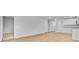 Spacious living area with light floors, neutral walls and easy access to the kitchen at 407 Spruce Ivy St, Moncks Corner, SC 29461
