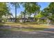 Spacious backyard featuring a gazebo, perfect for outdoor entertaining and relaxation in a serene setting at 408 N Palmetto St, Summerville, SC 29483