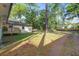 Expansive backyard with a charming gazebo, offering plenty of space for outdoor activities and relaxation at 408 N Palmetto St, Summerville, SC 29483