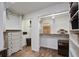Organized walk-in closet with custom shelves and drawers, offering ample storage space at 408 N Palmetto St, Summerville, SC 29483