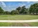 Well-maintained community tennis courts surrounded by lush greenery for recreational play at 408 N Palmetto St, Summerville, SC 29483