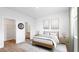 Comfortable bedroom featuring a large window, natural light, and a clean, modern aesthetic at 414 Mistflower Ln, Moncks Corner, SC 29461