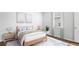 Serene bedroom with neutral tones, natural light, a comfortable bed, and stylish decor at 414 Mistflower Ln, Moncks Corner, SC 29461