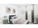 Stylish bedroom with soft colors, modern art, and a cozy atmosphere for relaxation at 414 Mistflower Ln, Moncks Corner, SC 29461