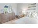 Bright bedroom with natural light, oars on the wall, and coastal decor at 415 Mistflower Ln, Moncks Corner, SC 29461