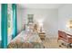 Charming bedroom with turquoise curtains, light walls, and a beautiful patterned bed set at 415 Mistflower Ln, Moncks Corner, SC 29461