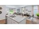 Modern kitchen with stainless steel appliances and an open layout with access to the dining and living area at 415 Mistflower Ln, Moncks Corner, SC 29461