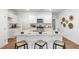 Modern kitchen with granite countertops, stainless steel appliances, and a breakfast bar at 415 Mistflower Ln, Moncks Corner, SC 29461