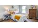 Comfortable bedroom with luxury linens, bright natural light and modern accessories at 416 Mistflower Ln, Moncks Corner, SC 29461