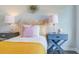 Cozy bedroom featuring stylish decor, lamps on nightstands, and a comfortable bed with decorative pillows at 416 Mistflower Ln, Moncks Corner, SC 29461